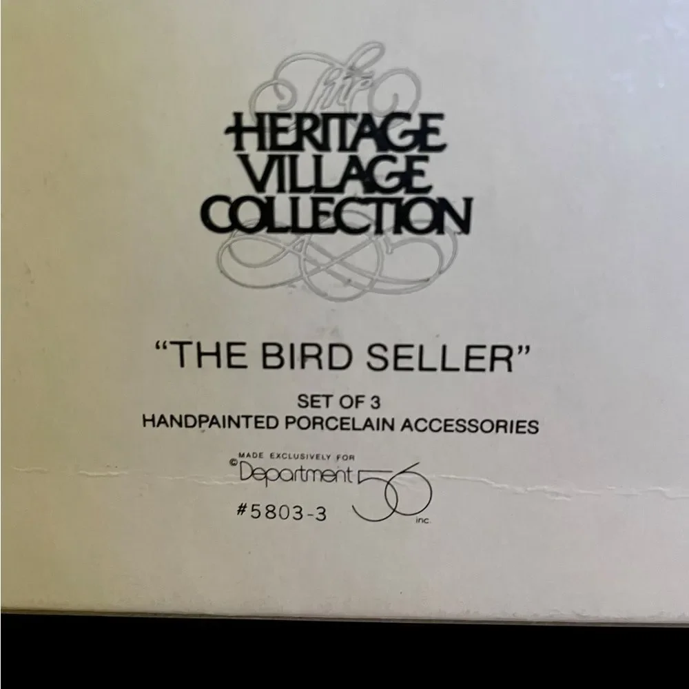 Department 56 Heritage‎ Village Collection 'The Bird Seller' Set